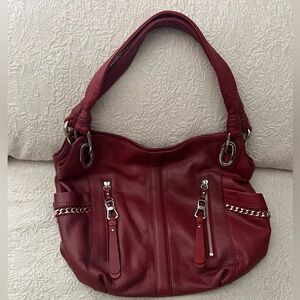 B. Makowsky Red Leather Shoulder Bag with silver detail.